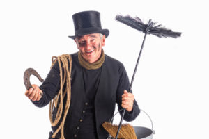 traditional chimney sweep in black clothign with hat and sweeping brush traditional chimney sweep in black clothign with hat and sweeping brush