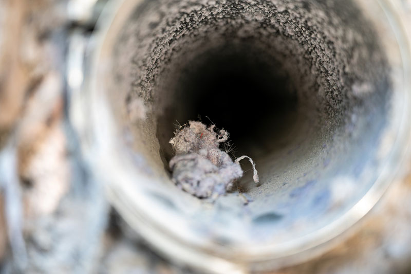 Dryer vent filled with lint